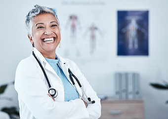 Image showing Happy, portrait and elderly woman doctor proud in hospital, excited and laugh for healthcare innovation. Face, elderly and female health expert smile for medical, mission or ready to help at clinic