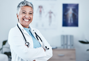 Image showing Portrait, happy and elderly woman doctor proud in hospital, excited and laugh for healthcare innovation. Face, elderly and female health expert smile for medical, mission or ready to help at clinic
