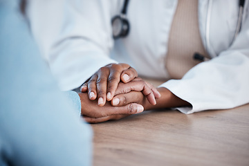 Image showing Holding hands closeup, doctor and patient consultation for healthcare support, services and sad news, test results or help. Clinic, medical professional or black people consulting, helping and advice