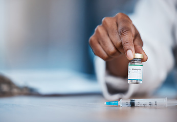 Image showing Monkeypox vaccine, medicine and doctor hands with bottle mockup, healthcare or booster vial for disease protection. Medical hospital clinic, pharmacy pharmacist or black woman with virus immunization