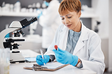 Image showing Scientist, woman and writing report with results, focus or analytics in pharma laboratory. Science expert, checklist or research with blood sample, medical innovation or study at pharmaceutical trial