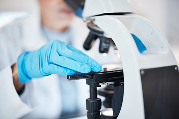 Image showing Hands, medical science and microscope in a laboratory for research, analysis and study. Scientist person in lab for futuristic development, innovation and biotechnology with dna or bacteria particle