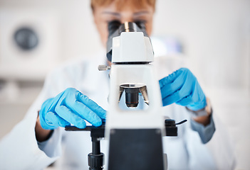 Image showing Laboratory, scientist hands and microscope for research, analysis and to study medicine. Medical science with a woman in lab for future, innovation and biotechnology with dna or bacteria particle