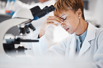 Image showing Scientist with headache, tired and overworked, woman and burnout with pain, deadline and overtime. Medical research, scientific stress and senior female in science, fatigue and overwhelmed in lab