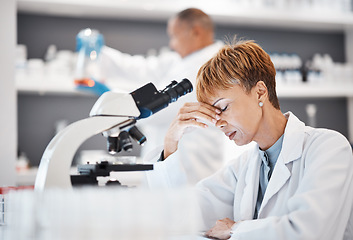 Image showing Scientist with headache, burnout and tired with woman, overworked with overtime for science breakthrough. Medical research, scientific innovation and senior female, fatigue and overwhelmed in lab