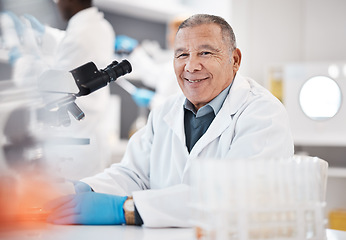 Image showing Science, laboratory and portrait of senior scientist with microscope for research, medical study and analytics. Healthcare, biotechnology and old man with smile for experiment, chemistry and medicine