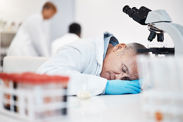 Image showing Scientist sleeping, tired and overwork with man and burnout with insomnia from overtime. Medical research, scientific stress and senior male in science, fatigue and overwhelmed in laboratory