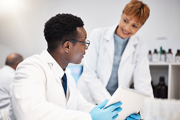 Image showing Science team, research and people with tablet in laboratory for experiment, study and medical results. Healthcare, pharmaceutical and scientists talking with digital tech for vaccine data analysis