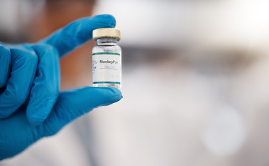 Image showing Hands, mockup and monkeypox vaccine in a hospital with a doctor holding a bottle of treatment or cure. Healthcare, medical and research with a medicine professional working in a laboratory