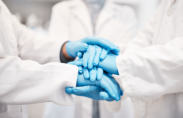 Image showing Doctor, team and hands together with gloves in healthcare, partnership or trust for collaboration, unity or support at lab. Group of medical experts piling hand in teamwork for motivation or safety
