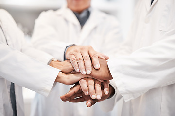 Image showing Doctor, team and hands together in healthcare, partnership or trust for collaboration, unity or support at lab. Group of medical experts piling hand in teamwork for motivation, cooperation or union