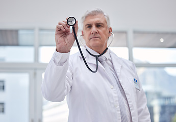 Image showing Doctor, stethoscope or cardiology man in hospital trust, healthcare wellness or life insurance support. Mature, medical or listening equipment for clinic worker, surgery expert or lungs professional