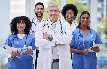 Image showing Doctors, nurses and arms crossed portrait with leadership, tablet or paper results in diversity hospital, about us or support. Smile, happy or healthcare worker people in teamwork collaboration group