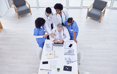 Image showing Top view, doctors and nurses on teamwork laptop for training, learning or workshop of medicine or hospital collaboration. Planning, men and healthcare diversity women on meeting technology research