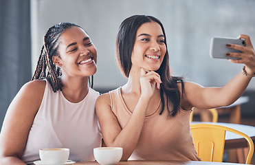 Image showing Women friends, coffee shop and selfie with happy solidarity, beauty and social network. Gen z black woman, latte or matcha for energy, relax and cafe for blog, profile picture or photography app