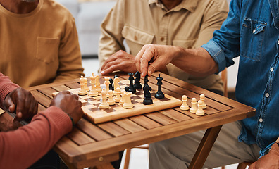 Image showing Hands, chess and friends in board games on wooden table for strategic competition, tactical move or decision. Hand of skilled strategy player holding black bishop playing game with friend in tactics