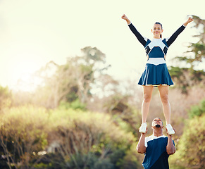 Image showing Cheerleading student, lift pose and mockup outdoor for cheer camp with exercise and fitness. Students, air posing and strong male athlete doing training and workout with cardio and mock up in nature