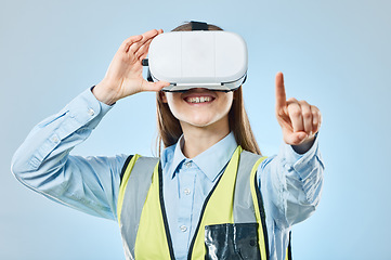 Image showing Business, virtual reality glasses and woman pointing, success and girl against blue studio background. Vr, female employee and manager with futuristic technology, digital planning and online system