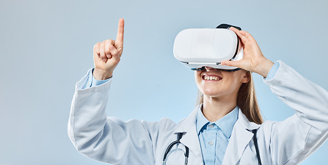 Image showing Vr, medical and touch with doctor and headset for augmented reality, healthcare and virtual analysis. Future, cyber and technology with woman and research for expert, medicine or science in studio