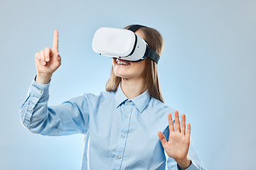 Image showing VR headset, woman and metaverse, futuristic technology with virtual screen on blue background. Digital, video game and user experience with happy young female, hands and press invisible button