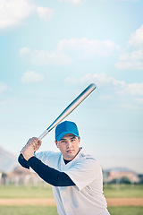 Image showing Sports, baseball and portrait of man with bat on field ready to hit ball in game, practice and competition. Fitness, focus and male athlete outdoors for exercise, training and workout for sport match