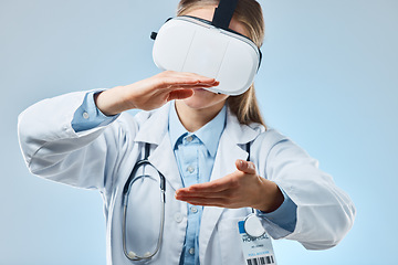 Image showing Vr, medical and holding with doctor and headset for augmented reality, healthcare and virtual analysis. Future, cyber and technology with woman and research for expert, medicine or science in studio