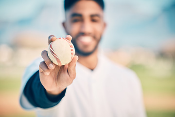 Image showing Baseball field, portrait and pitcher holding ball on match or game day on a sports ground or pitch feeling happy. Sport, athlete and blur pitcher at training with a smile due to health and wellness