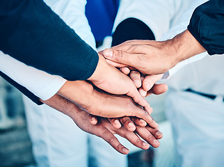 Image showing Closeup, hands and team with support, motivation and fitness for game, competition and exercise. Zoom, hand and group with solidarity, inspiration and training with wellness, target and workout goals