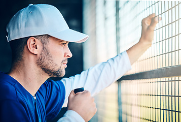 Image showing Sports, serious and baseball with man in dugout for thinking, training and planning strategy. Relax, fitness and workout with athlete in park stadium for focus, competition match or coaching