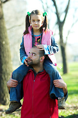 Image showing child on father shoulder