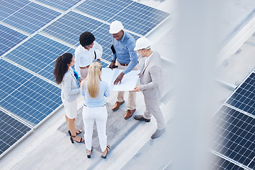 Image showing Solar energy, business people or engineering team with blueprint on roof building grid technology for sustainability. Collaboration, top or employees talking or planning development project strategy