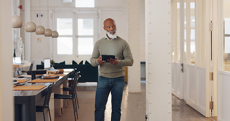 Image showing Planning, networking and black man in real estate with a tablet, reading email and search for property online. Connection, typing and senior African realtor walking with tech for communication on web