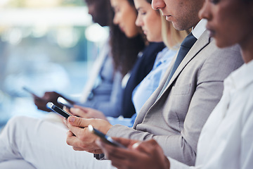 Image showing Hands, phone and hr with a group of people waiting in line for an interview or meeting. Mobile, hiring and recruitment with business collegues sitting in a human resources candidate shortlist row