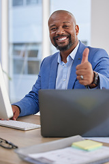 Image showing Happy black man, laptop and thumbs up for winning, good job or success in marketing at the office desk. Portrait of African American male showing thumb emoji, yes sign or like in thanks by computer