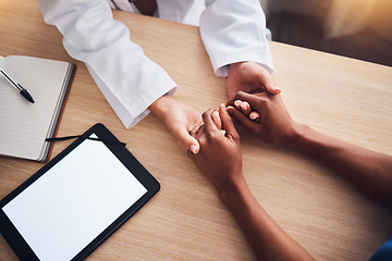 Image showing Doctor holding hands, tablet mockup and patient consultation support, healthcare services and test results advice. Digital screen, product placement space and medical people empathy and helping above