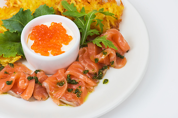 Image showing potato pancakes salmon fish and red caviar