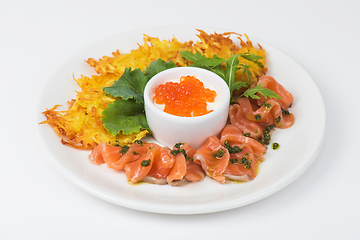 Image showing potato pancakes salmon fish and red caviar