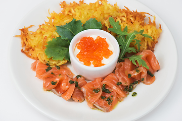 Image showing potato pancakes salmon fish and red caviar