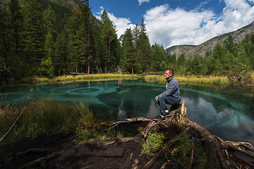 Image showing Man at Beautiful Geyser lake