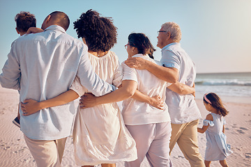 Image showing Big family hug, love and beach walking, bonding or enjoy quality time together for vacation, holiday peace or freedom. Ocean sea, summer travel and back view of relax people in Rio de Janeiro