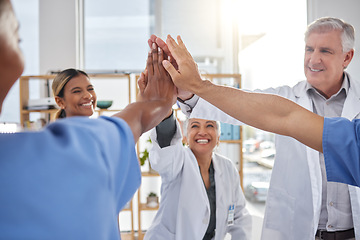 Image showing Success, high five or nurses in meeting for a strategy, goals or working in hospital for healthcare. Hands together, team building or group of happy doctors with a target mission planning ideas