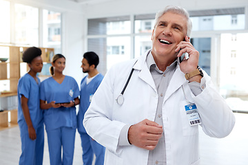 Image showing Phone call, hospital office and senior doctor online for research, telehealth and medical consulting. Healthcare, clinic and happy man health worker on smartphone for talking, discussion and speaking