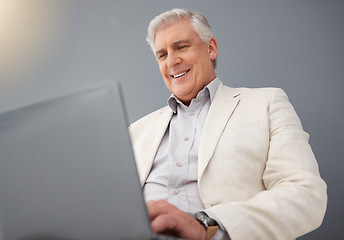 Image showing Senior business man, laptop and studio background for planning, online strategy and email website. Happy executive ceo working on computer technology, corporate management and professional smile