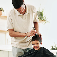 Image showing Family, children and haircut with a father shaving the hair of his son together in the home for grooming. Kids, barber and hairstyle with a man cutting the head of his son as a hairdresser in a house