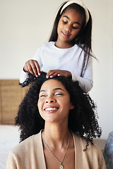 Image showing Children, black family and hair with a girl styling her mother in their home for haircare or bonding. Kids, love or style with a female child and woman bonding together over a hairstyle treatment