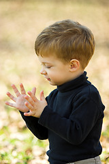 Image showing boy clapping