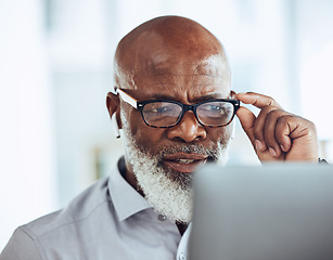 Image showing Confused businessman, glasses or reading laptop in corporate office of finance budget crisis, taxes audit problem or financial loss. Worried CEO, doubt or black man with technology or earphones fail