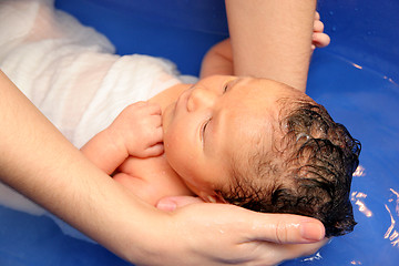 Image showing baby girl in a bathtub