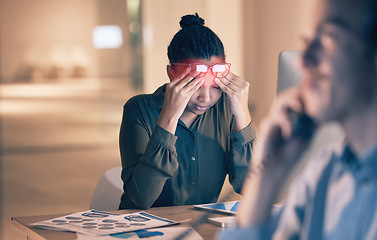 Image showing Business woman, headache and computer in stress, burnout or suffering pain at night by office desk. Female employee rubbing head or touching painful area by desktop PC feeling overworked at workplace