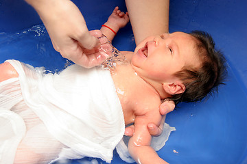 Image showing baby girl in a bathtub